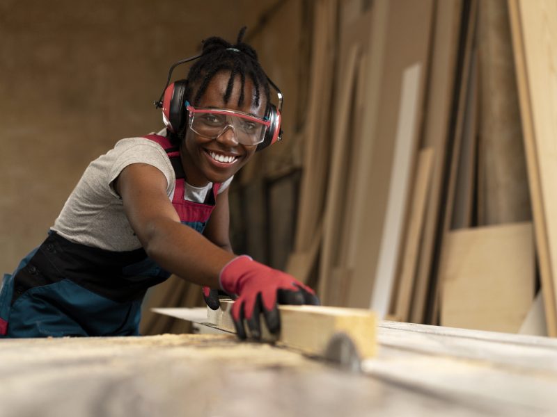 carpenter-cutting-mdf-board-inside-workshop