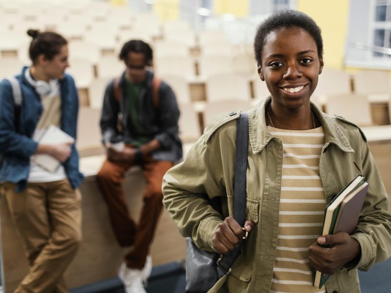 portrait-student-front-colleagues